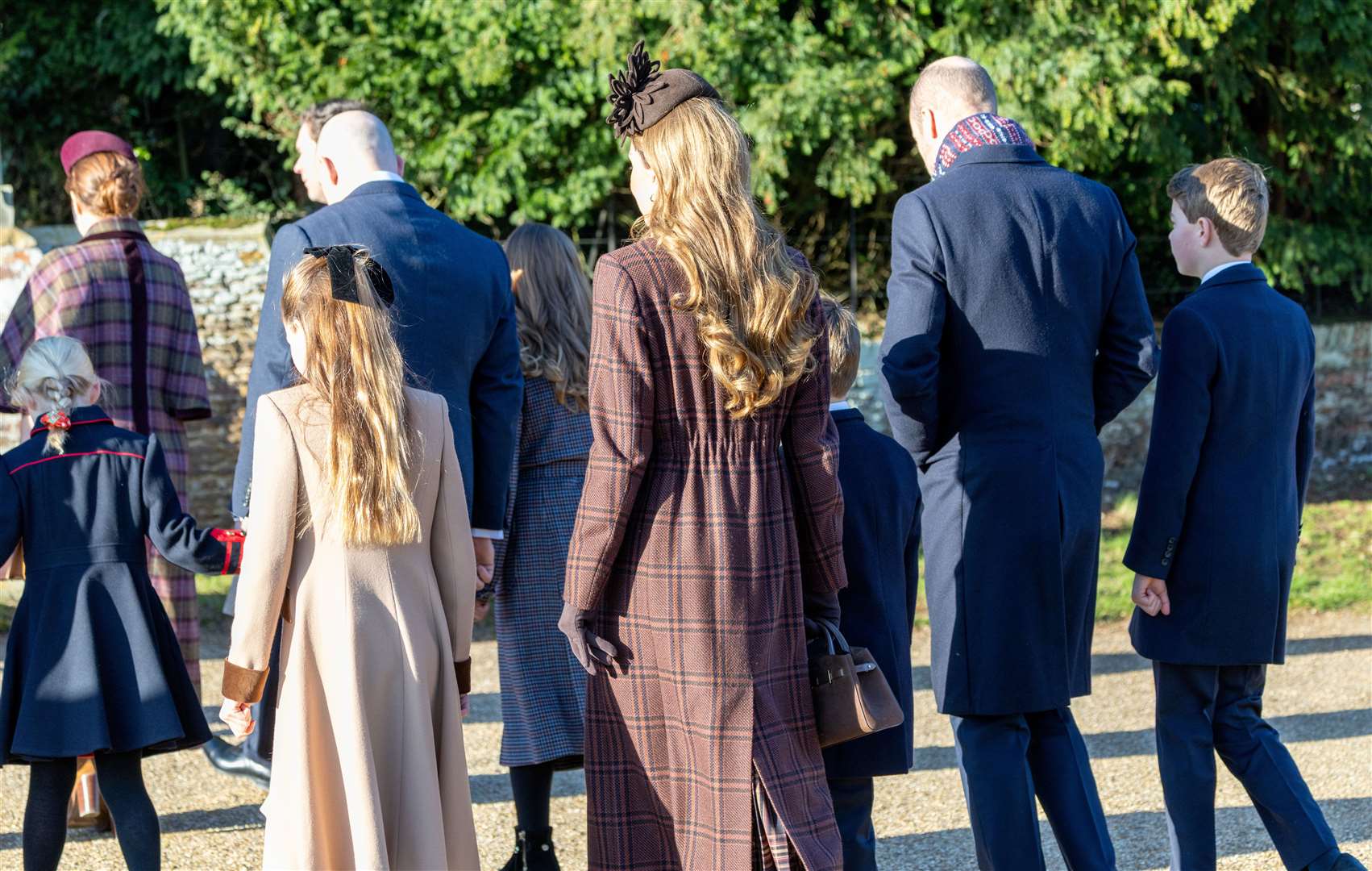 PIC BY GEOFF ROBINSON PHOTOGRAPHY 07976 880732. Picture dated December 25th shows the Royal Family attending Christmas morning service at St Mary Magdalene church in Sandringham. Picture shows King Charles, Queen Camilla, Prince William, Prince of Wales, Catherine, Princess of Wales and Prince George, Prince Louis and Princess Charlotte.
