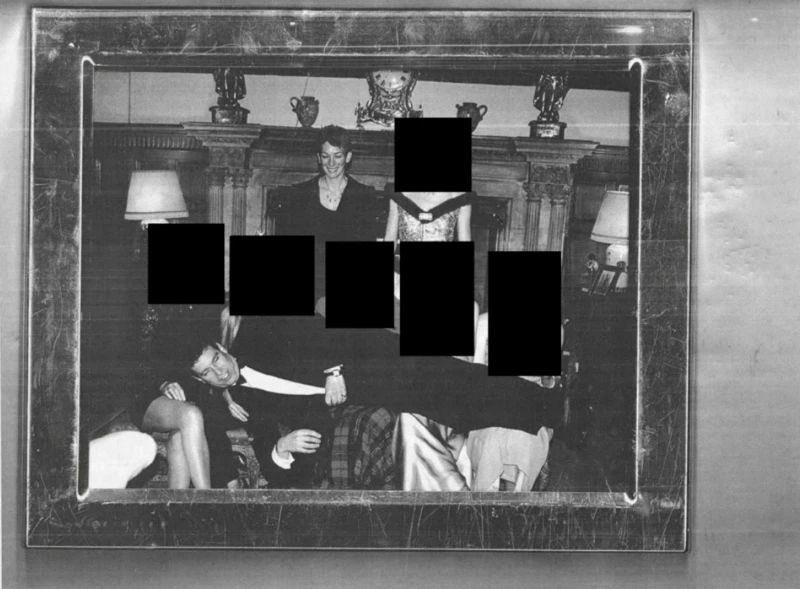 Andrew Mountbatten-Windsor, formerly Prince Andrew, seen lying upon the laps of five unidentified women