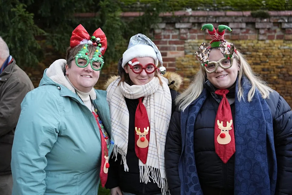 Members of the public wait for the royals to arrive at St Mary Magdalene (PA)