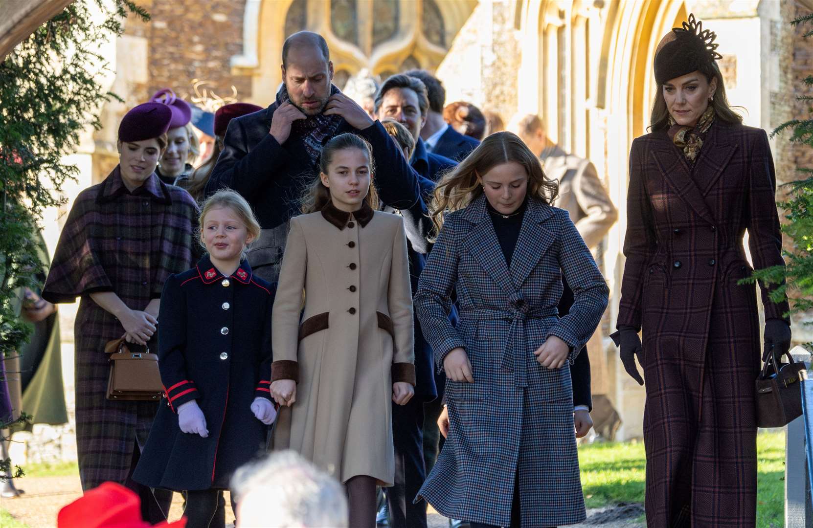 PIC BY GEOFF ROBINSON PHOTOGRAPHY 07976 880732. Picture dated December 25th shows the Royal Family attending Christmas morning service at St Mary Magdalene church in Sandringham. Picture shows Prince William, Prince of Wales, Catherine, Princess of Wales Princess Charlotte and Lena (left) and Mia Tindall.