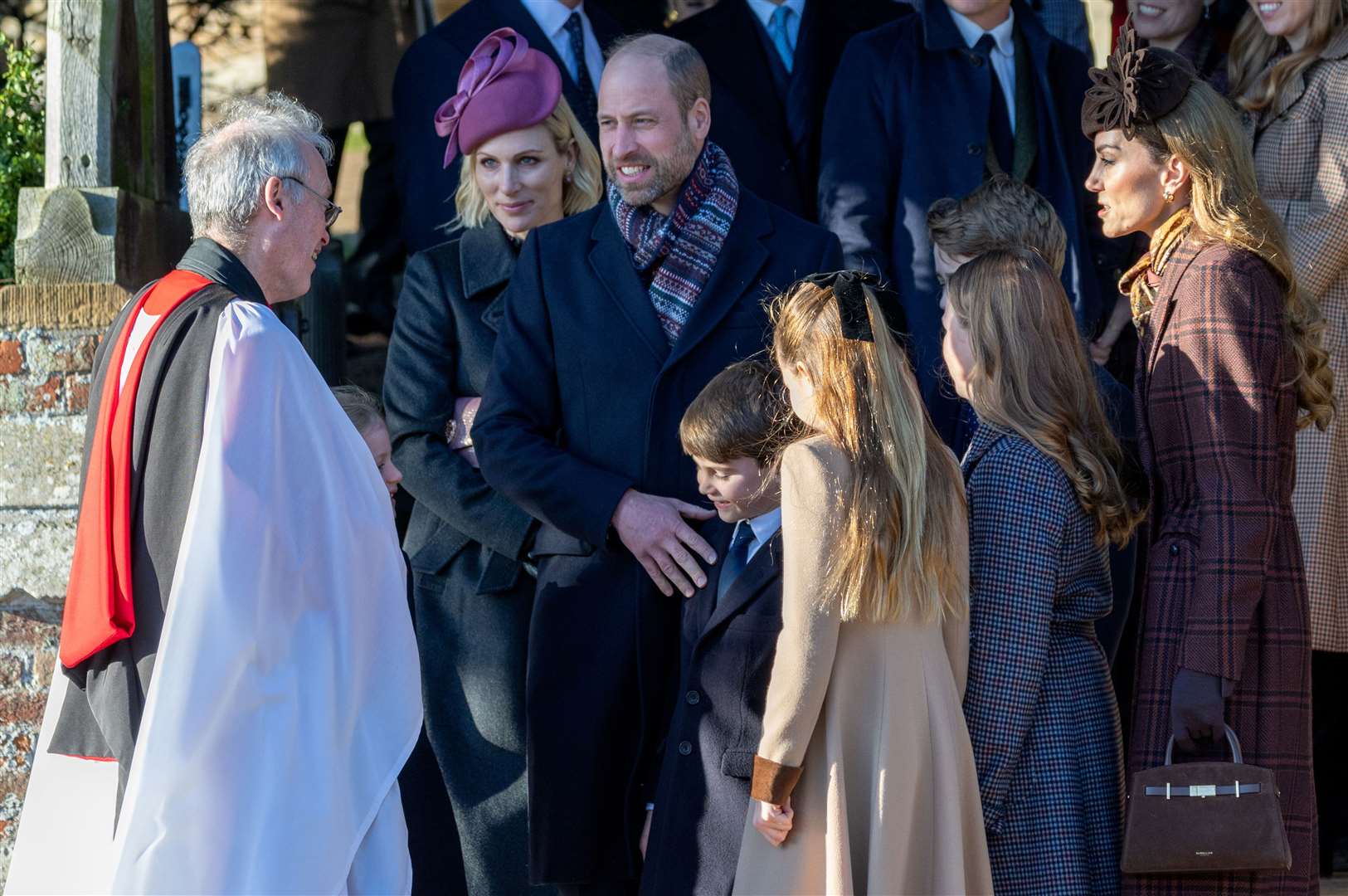 PIC BY GEOFF ROBINSON PHOTOGRAPHY 07976 880732. Picture dated December 25th shows the Royal Family attending Christmas morning service at St Mary Magdalene church in Sandringham. Picture shows Prince William, Prince of Wales, Catherine, Princess of Wales and Prince George, Prince Louis and Princess Charlotte.