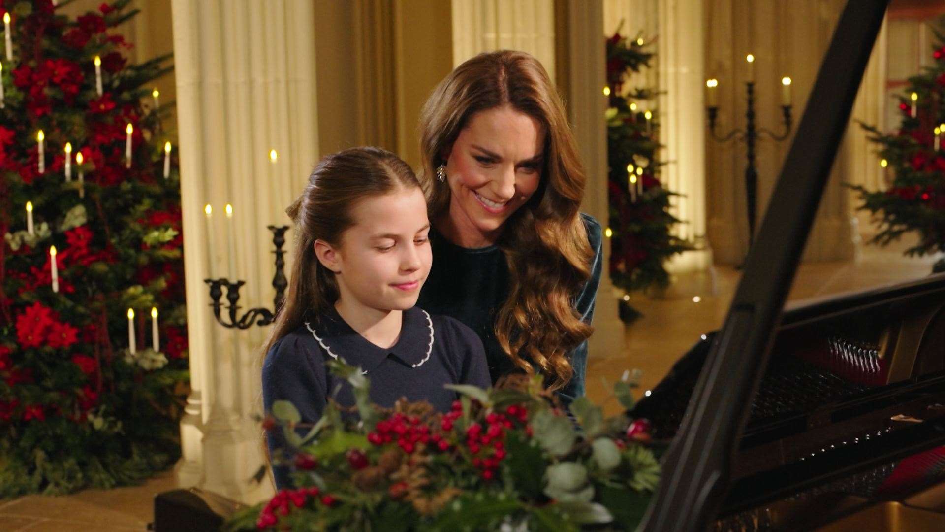 The Princess of Wales with Princess Charlotte playing piano (ITV handout)