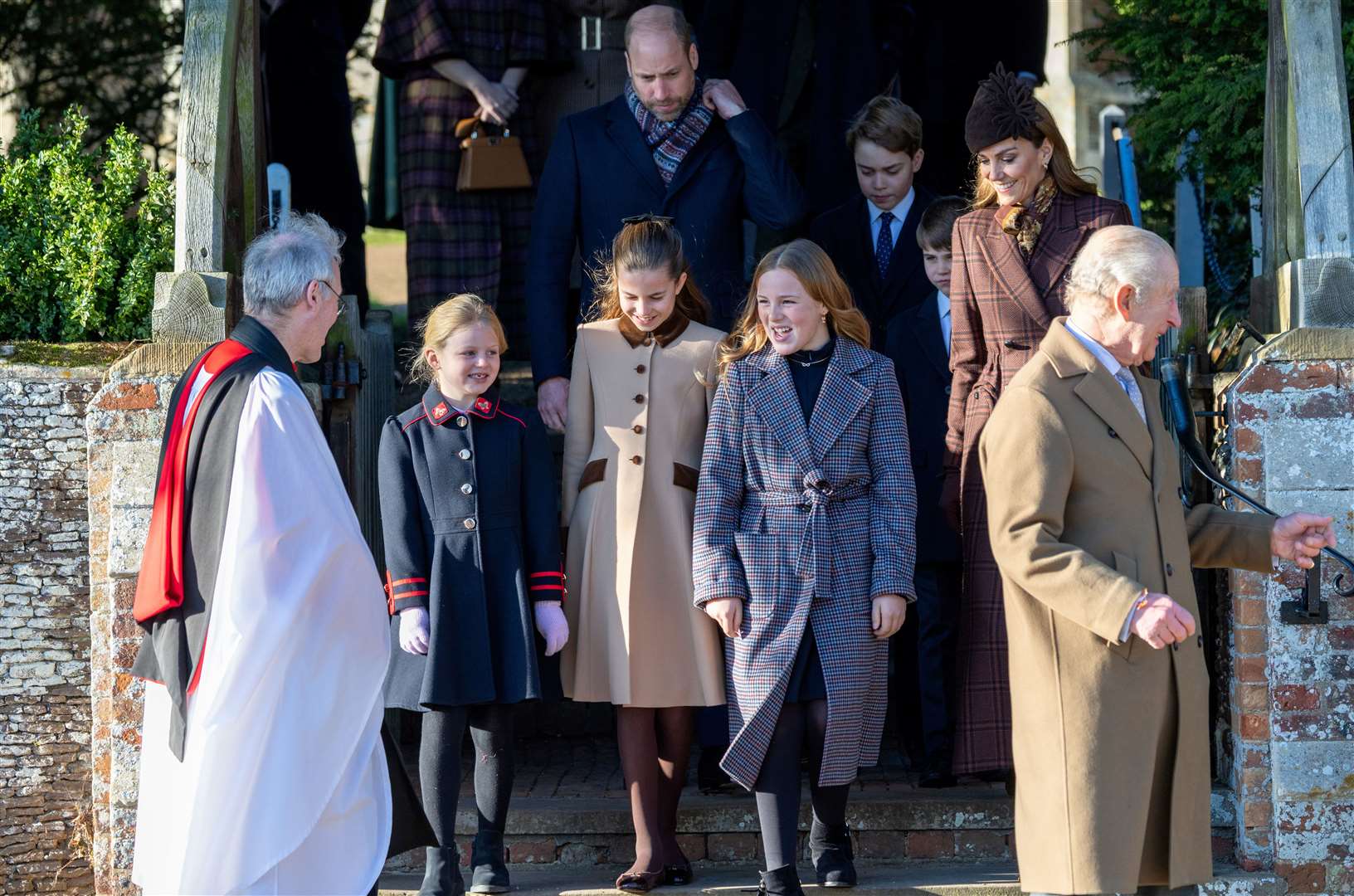 PIC BY GEOFF ROBINSON PHOTOGRAPHY 07976 880732. Picture dated December 25th shows the Royal Family attending Christmas morning service at St Mary Magdalene church in Sandringham. Picture shows King Charles, Queen Camilla, Prince William, Prince of Wales, Catherine, Princess of Wales and Prince George, Prince Louis and Princess Charlotte and Lena (left) and Mia Tindall.