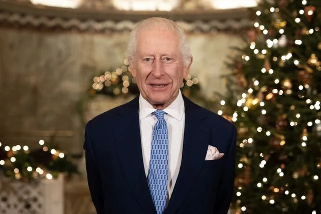 The King during the recording of his Christmas message at the Fitzrovia Chapel in central London 