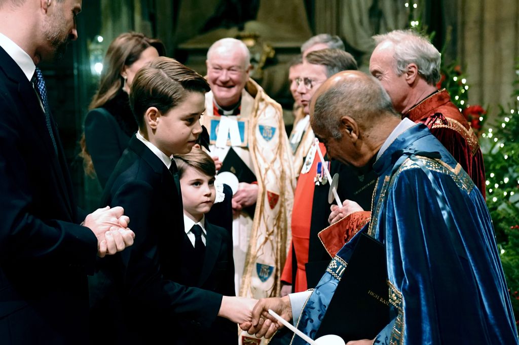 Prince George and his brother Prince Louis are greeted as they arrive for the Together At Christmas carol service at Westminster Abbey