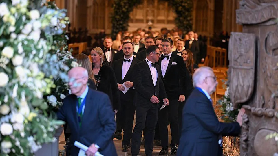 Guests leave the wedding of Adam Peaty and Holly Ramsay at Bath Abbey on December 27, 2025 in Bath, England
