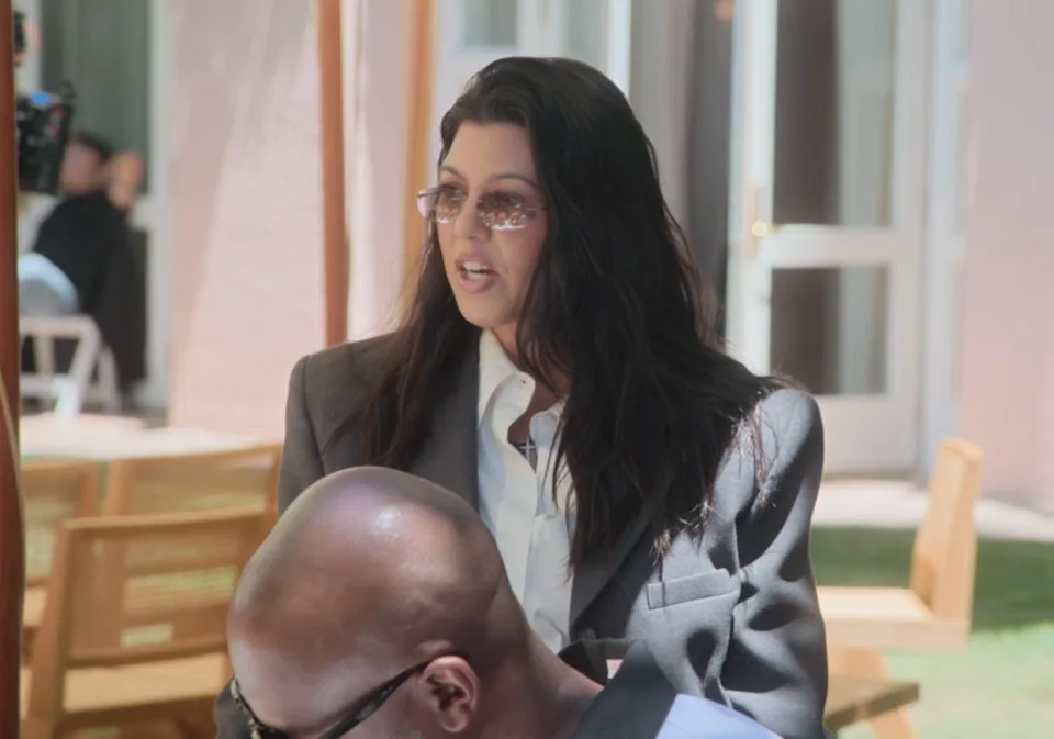 Kourtney speaking to a group outdoors