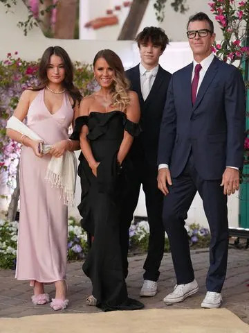 Eric McCandless/Disney via Getty Ryan and Trista Sutter with their kids in 2024
