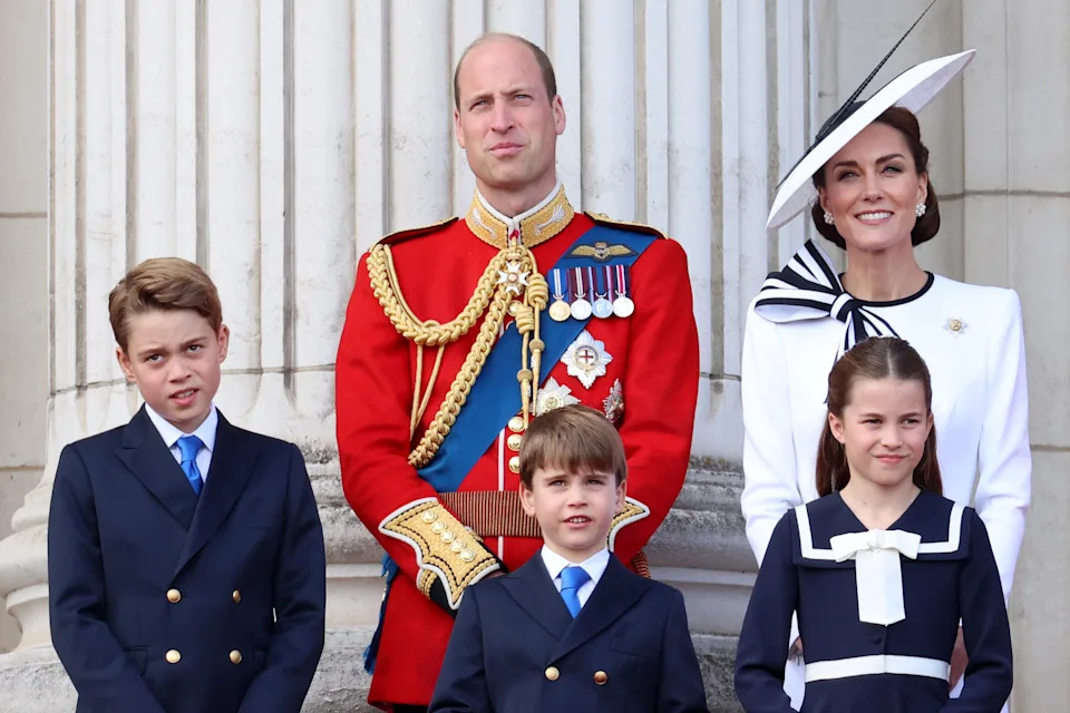 LONDON, ENGLAND - JUNE 15: Prince George of Wales, Prince William, Prince of Wales, Prince Louis of Wales, Princess Charlotte of Wales and Catherine, Princess of Wales during Trooping the Colour at Buckingham Palace on June 15, 2024 in London, England. Trooping the Colour is a ceremonial parade celebrating the official birthday of the British Monarch. The event features over 1,400 soldiers and officers, accompanied by 200 horses. More than 400 musicians from ten different bands and Corps of Drums march and perform in perfect harmony. (Photo by Chris Jackson/Getty Images)