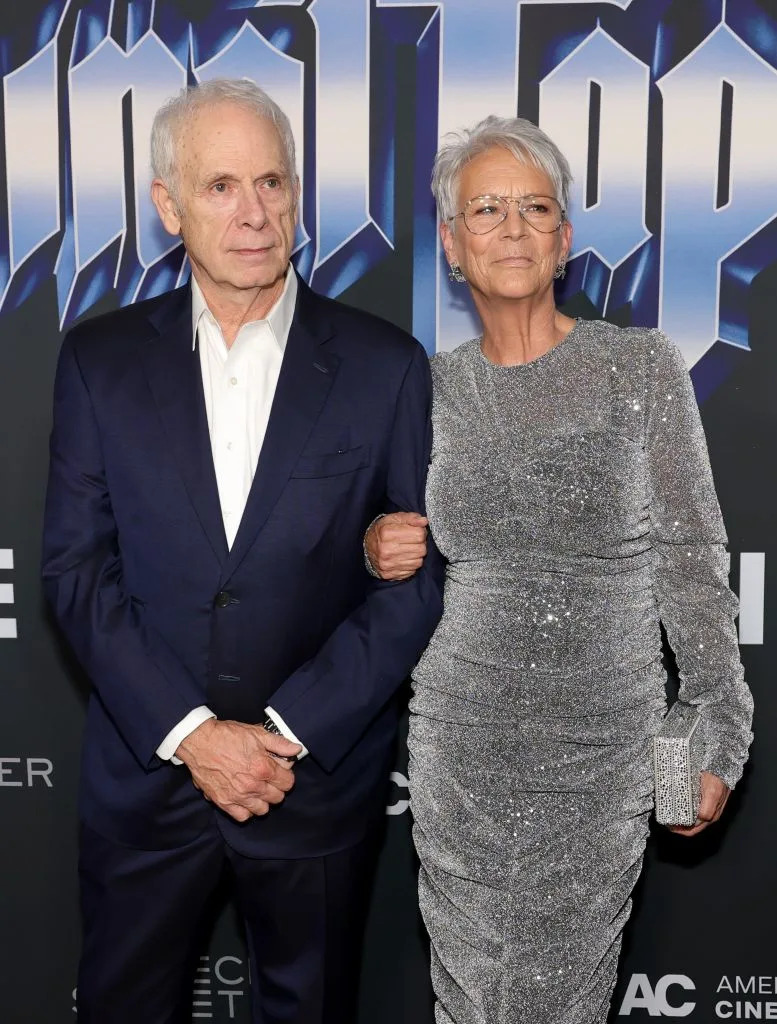 <p>Christopher Guest & Jamie Lee Curtis</p>