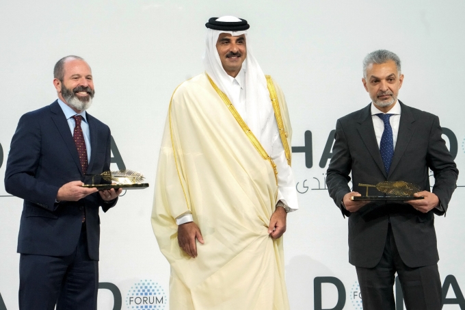Qatar’s Emir Sheikh Tamim bin Hamad Al-Thani (C) on the opening day of  the Doha Forum Award in Doha on Dec. 6, 2025. Photo by AFP