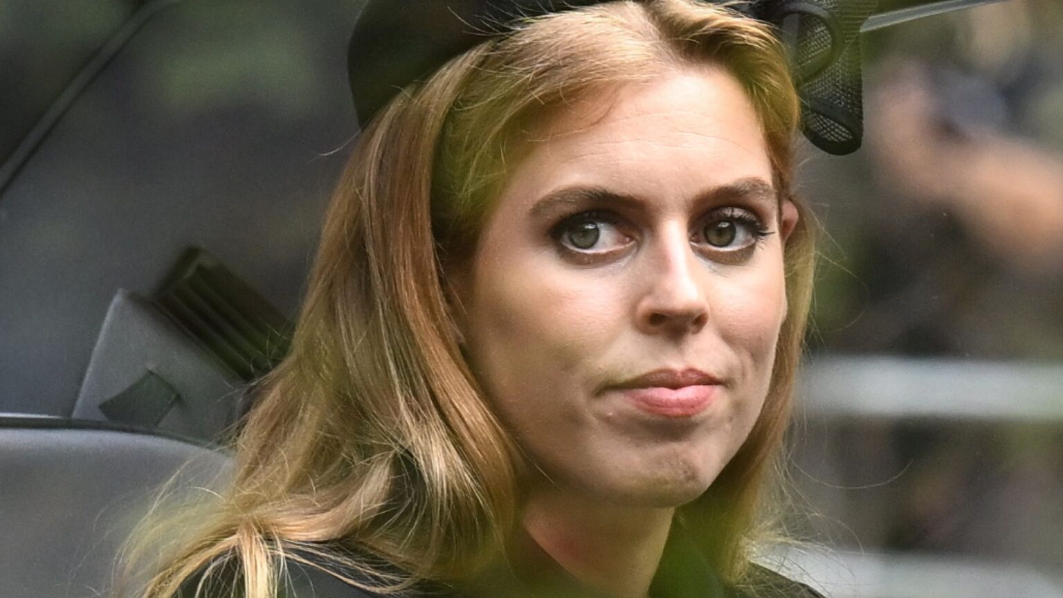 Prince Andrew and Sarah Ferguson Skipped Christening Party Princess Beatrice wears a black bow in her hair and a green coat