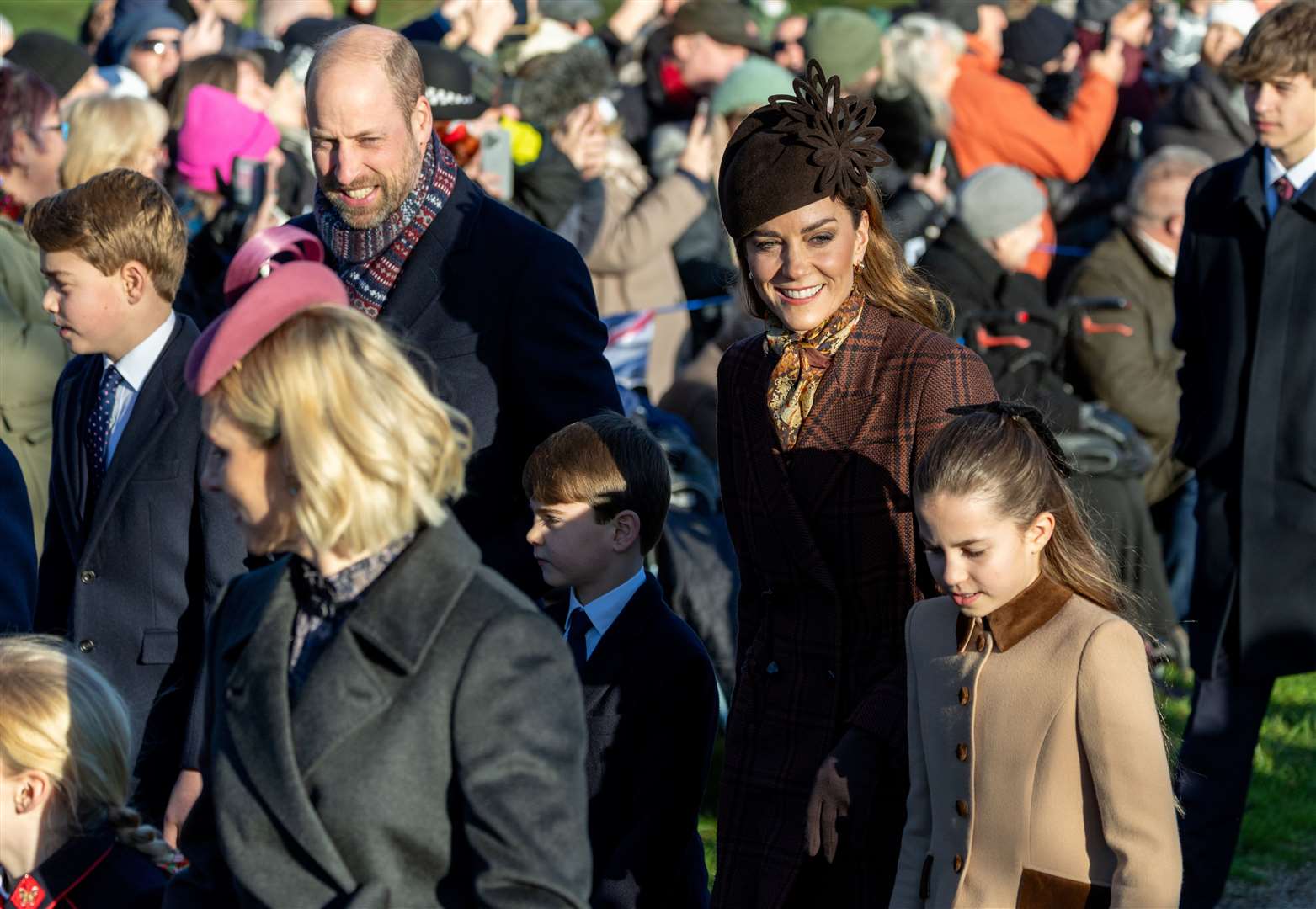PIC BY GEOFF ROBINSON PHOTOGRAPHY 07976 880732. Picture dated December 25th shows the Royal Family attending Christmas morning service at St Mary Magdalene church in Sandringham. Picture shows Prince William, Prince of Wales, Catherine, Princess of Wales and Prince George, Prince Louis and Princess Charlotte.