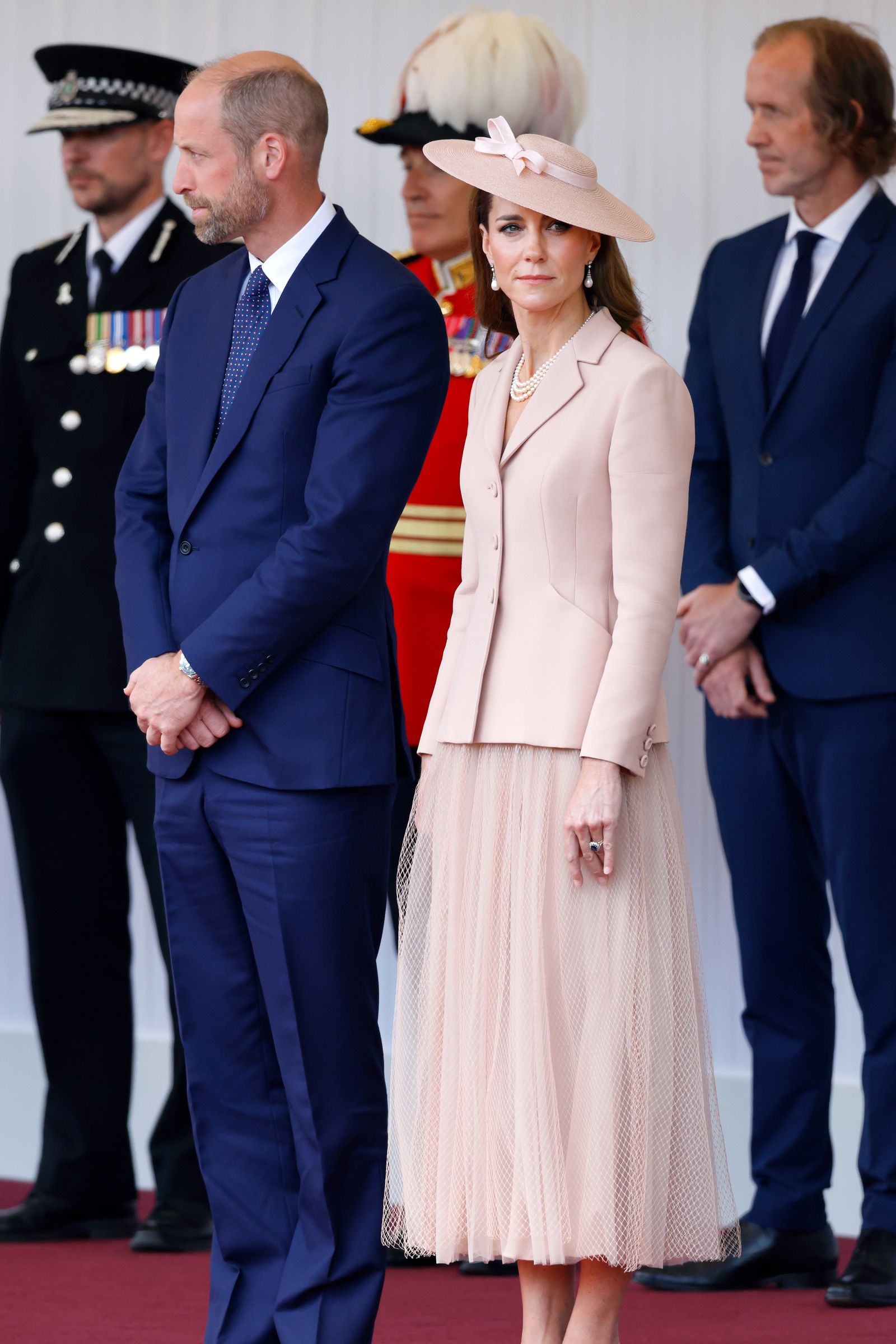 Image may contain Prince William Duke of Cambridge Petr Plack Person Adult Officer Accessories Formal Wear and Tie