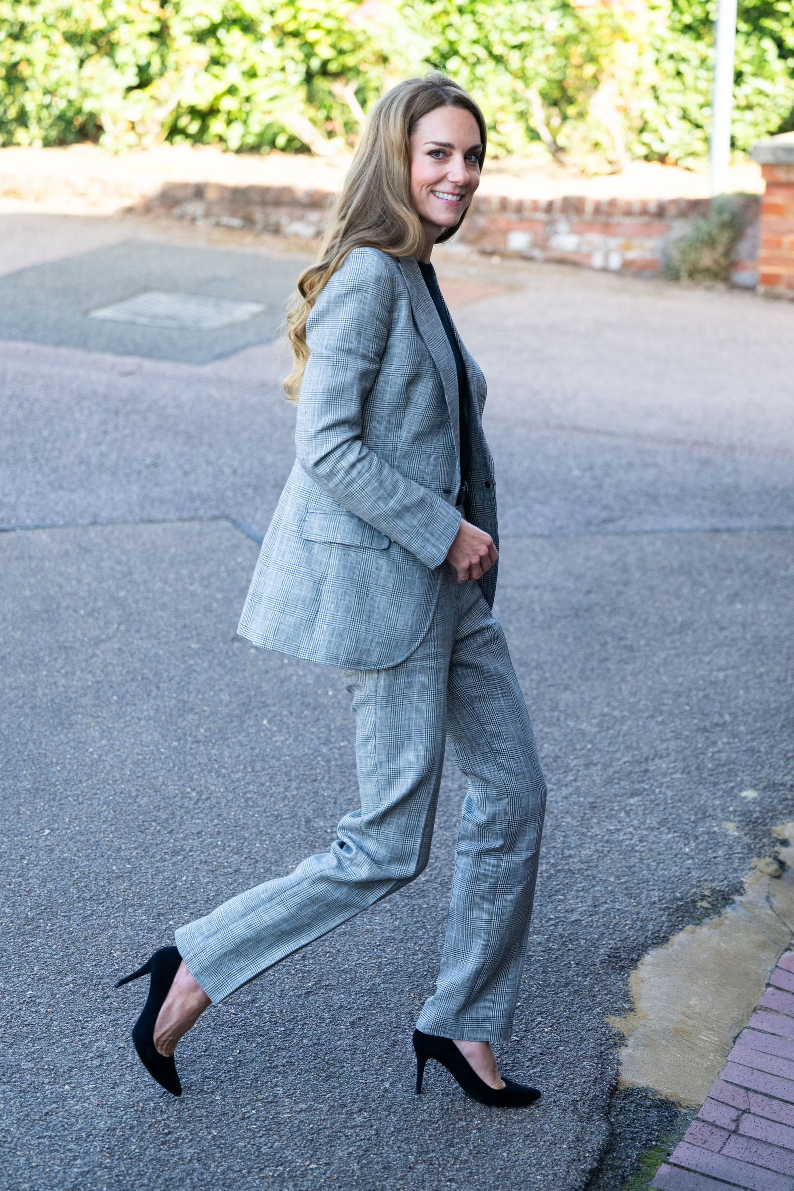 Image may contain Clothing Pants Jeans Formal Wear Suit Blazer Coat Jacket Footwear Shoe Adult and Person
