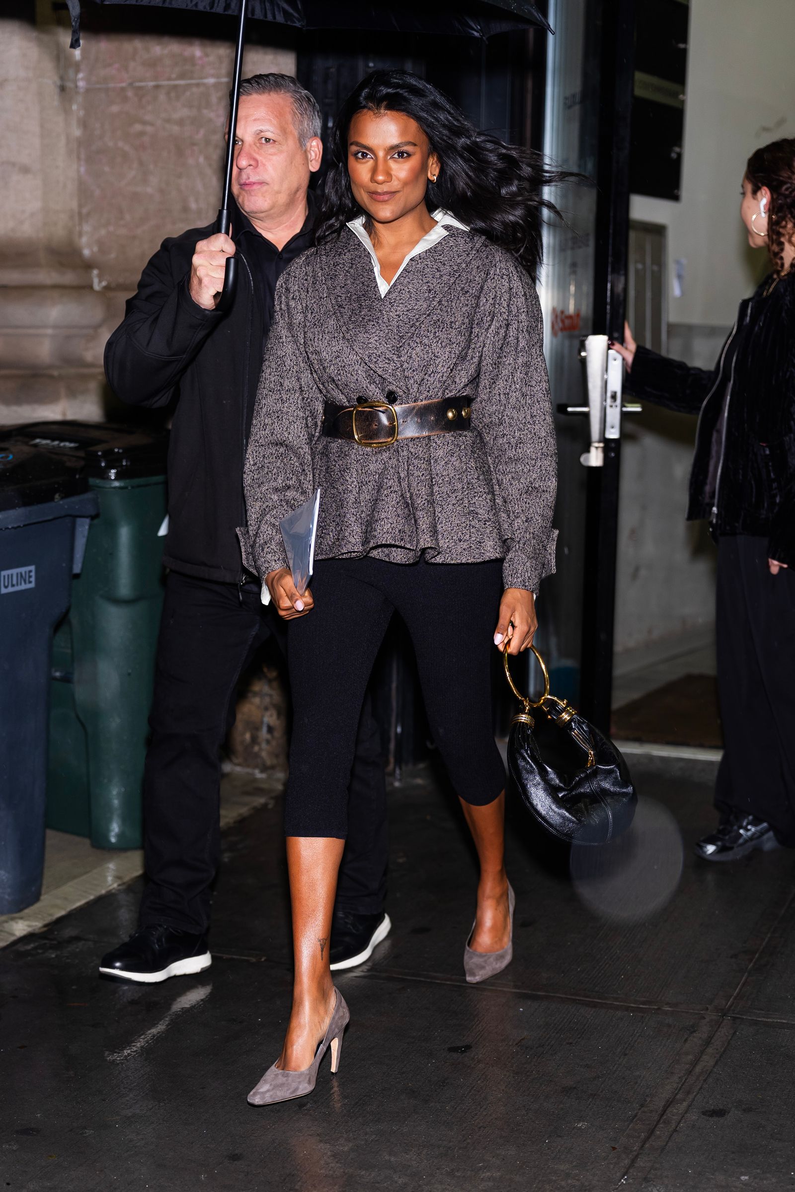 Image may contain Adult Person Accessories Bag Handbag Clothing Footwear Shoe Face Head and Photobombing