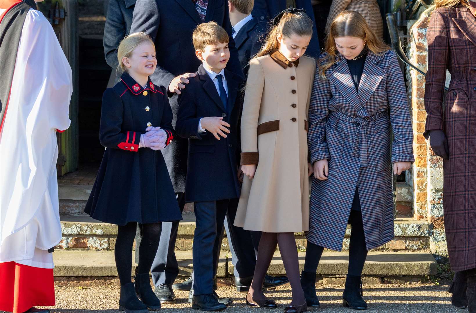 PIC BY GEOFF ROBINSON PHOTOGRAPHY 07976 880732. Picture dated December 25th shows the Royal Family attending Christmas morning service at St Mary Magdalene church in Sandringham. Picture shows (l-r) Lena Tindall Prince Louis and Princess Charlotte and Mia Tindall