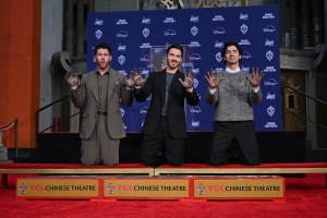 Nick Jonas, Kevin Jonas and Joe Jonas at the Jonas Brothers Hand and Footprint Ceremony held at TCL Chinese Theatre on December 03, 2025 in Los Angeles, California.