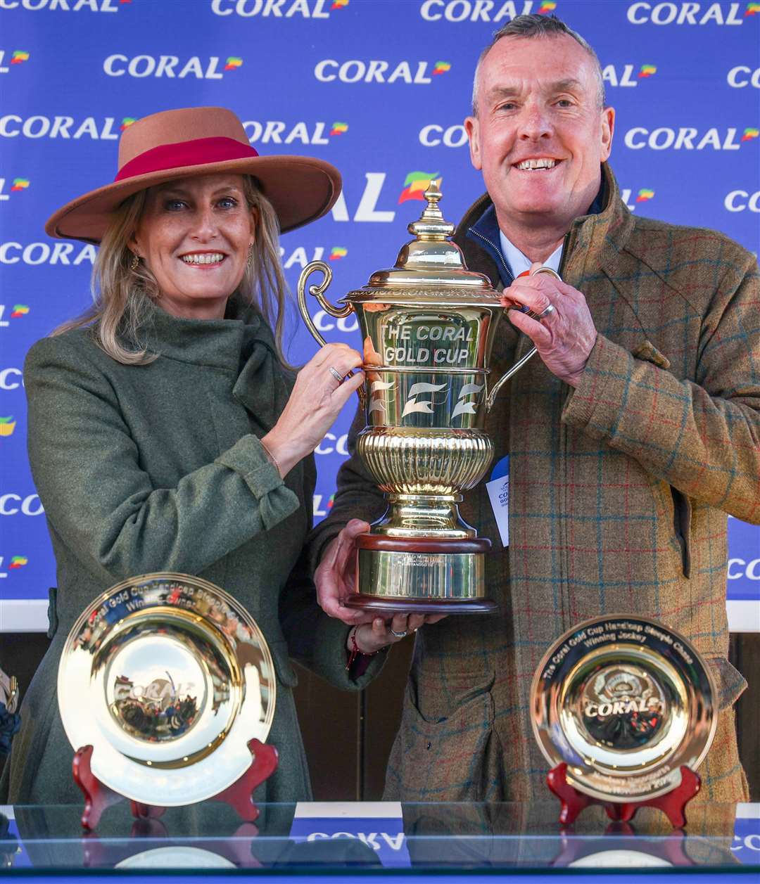Sophie, the Duchess of Edinburgh, presenting the trophy to Bryan Drew, the winning owner of the Coral Gold Cup