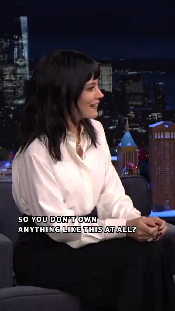 Lily Allen tries on the West End Girl puffer jacket on The Tonight Show Starring Jimmy Fallon
