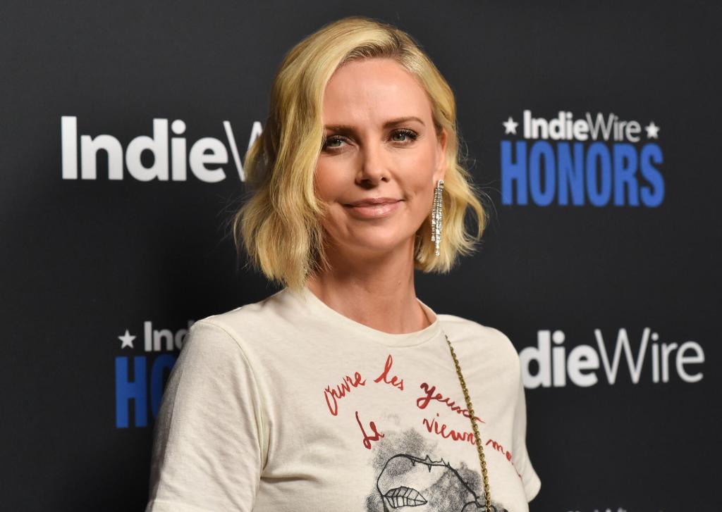Charlize Theron Wowed In a Completely Sheer, Black Lace Catsuit Charlize Theron Wowed In a Completely Sheer, Black Lace Catsuit