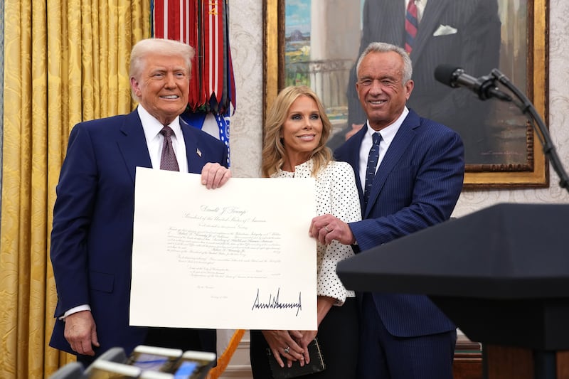U.S. President Donald Trump, Robert F. Kennedy Jr., and Kennedy's wife Cheryl Hines