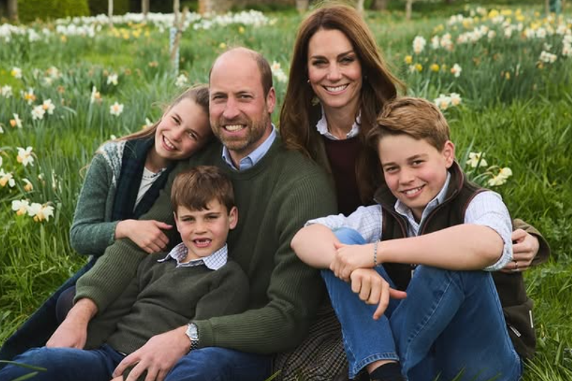 Prince William makes nod to title in family photo Prince William, Kate and their children sit in a field of daffodils for their Christmas card portrait