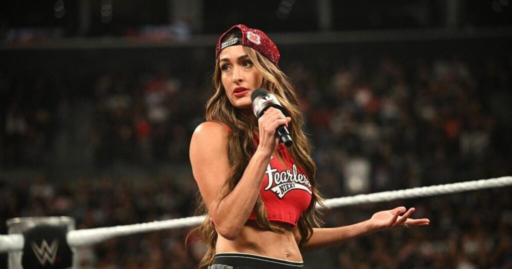 Nikki Bella’s Cooper DeJean Eagles Jersey Nearly Falls off in Video