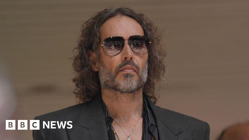 Russell Brand charged with new rape and sexual assault offences - BBC News