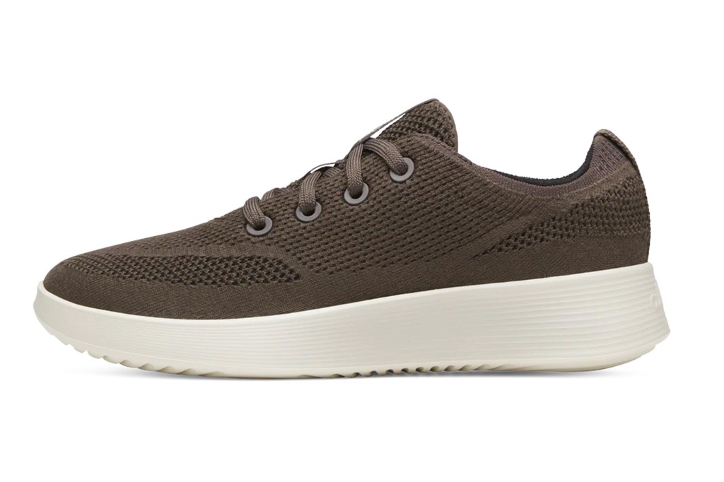Brown athletic shoe with white sole.