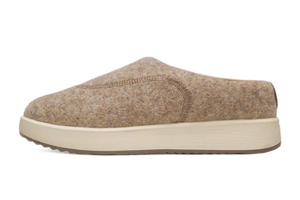 Brown felt slip-on shoe with a cream-colored platform sole.