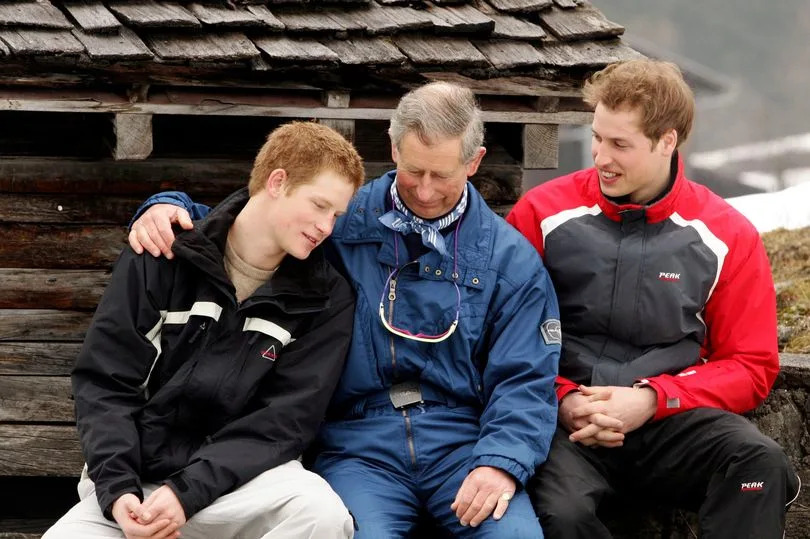 HRH Prince Charles poses with his sons Prince William (R) and Prince Harry (L) during the Royal Family's ski break at Klosters on March 31, 2005 in Switzerland