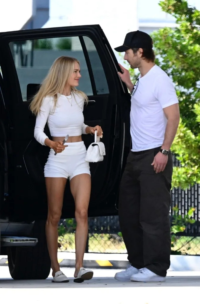 Glenn Powell and Michelle Randolph spent the holidays in Miami. BACKGRID