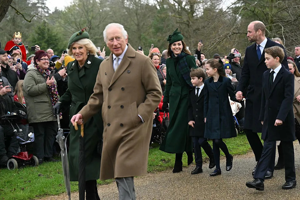OLI SCARFF/AFP via Getty King Charles and Queen Camilla and Prince William and Princess Kate and their children on Dec. 25, 2024