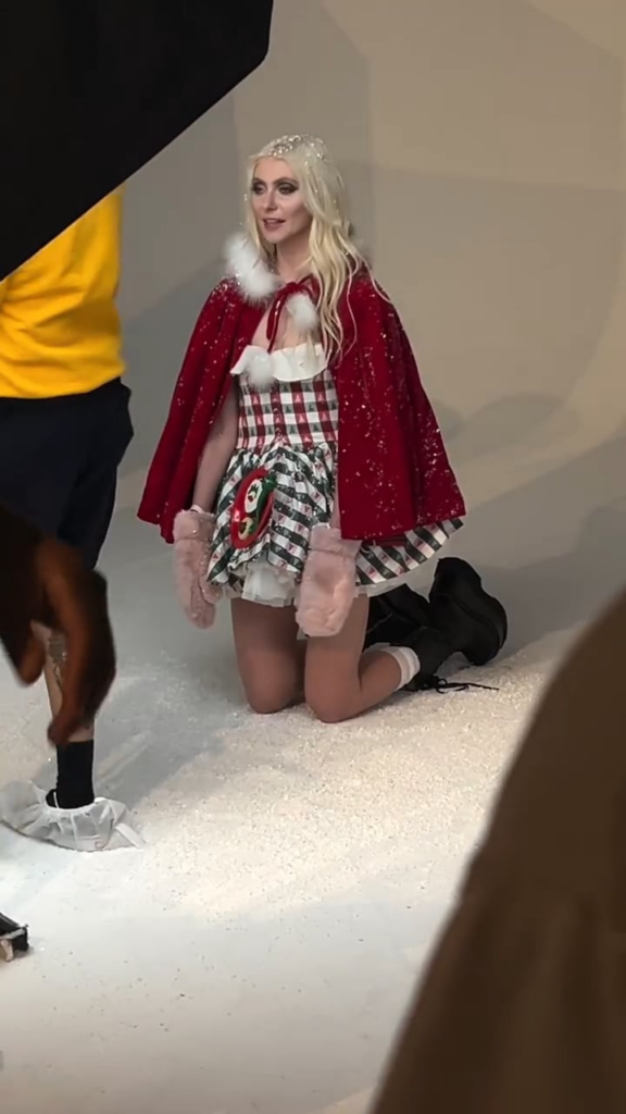 Taylor Momsen squeezes into her original Cindy Lou Who costume from "How the Grinch Stole Christmas" 25 years later for a photo shoot