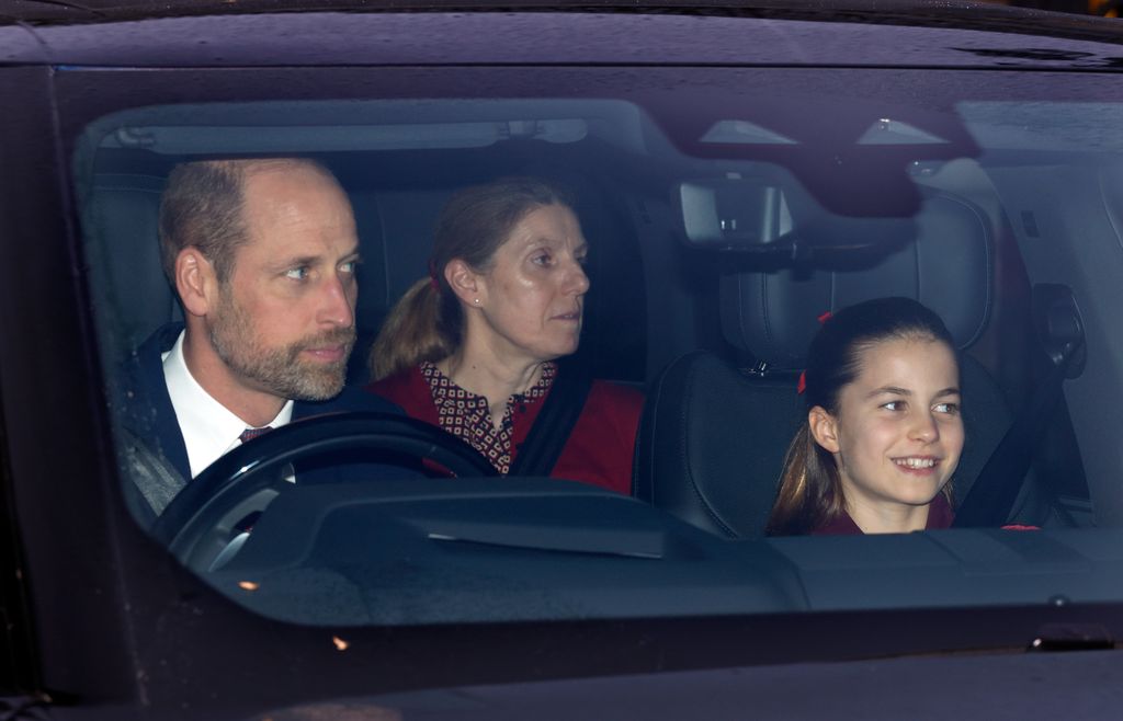 Prince William riding in a car with Princess Charlotte and Maria Teresa Turrion Borrallo