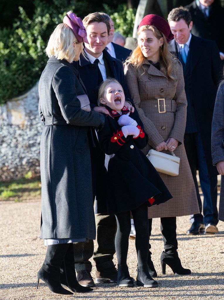 Lena Tindall being tickled by Princess Beatrice's husband, Edoardo Mapelli Mozzi outside church