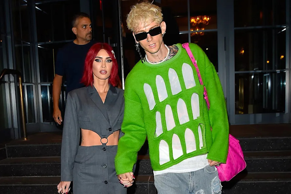 Raymond Hall/GC Images Megan Fox (L) and Machine Gun Kelly