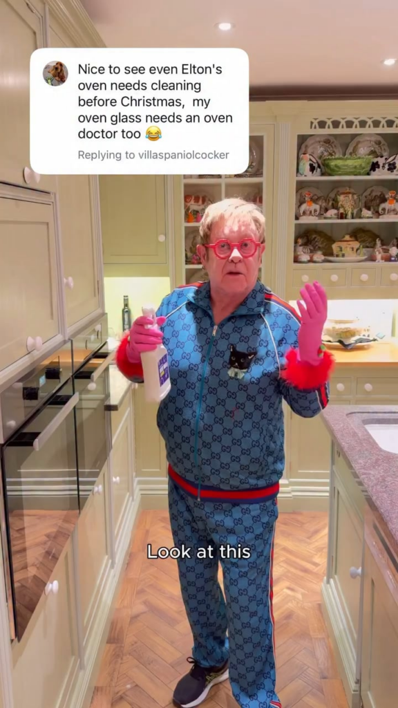 Elton John cleans his oven after someone called it dirty in a previous post