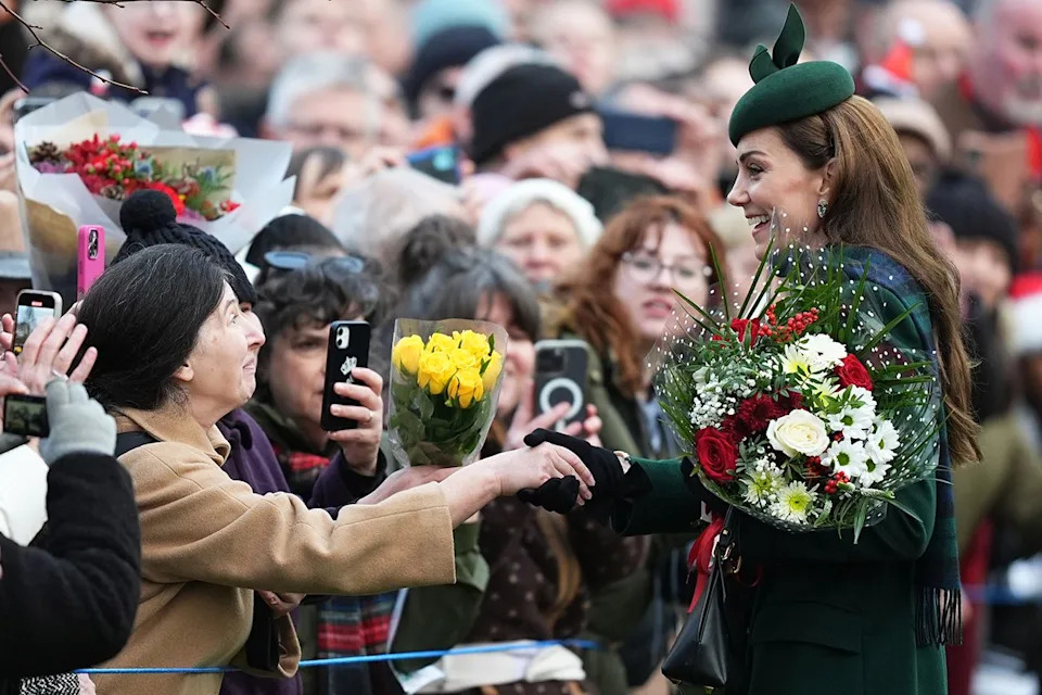  Aaron Chown/PA Images via Getty Kate Middleton speaks to members of the public following the Christmas Day morning church service at St. Mary Magdalene Church on Dec. 25, 2024.