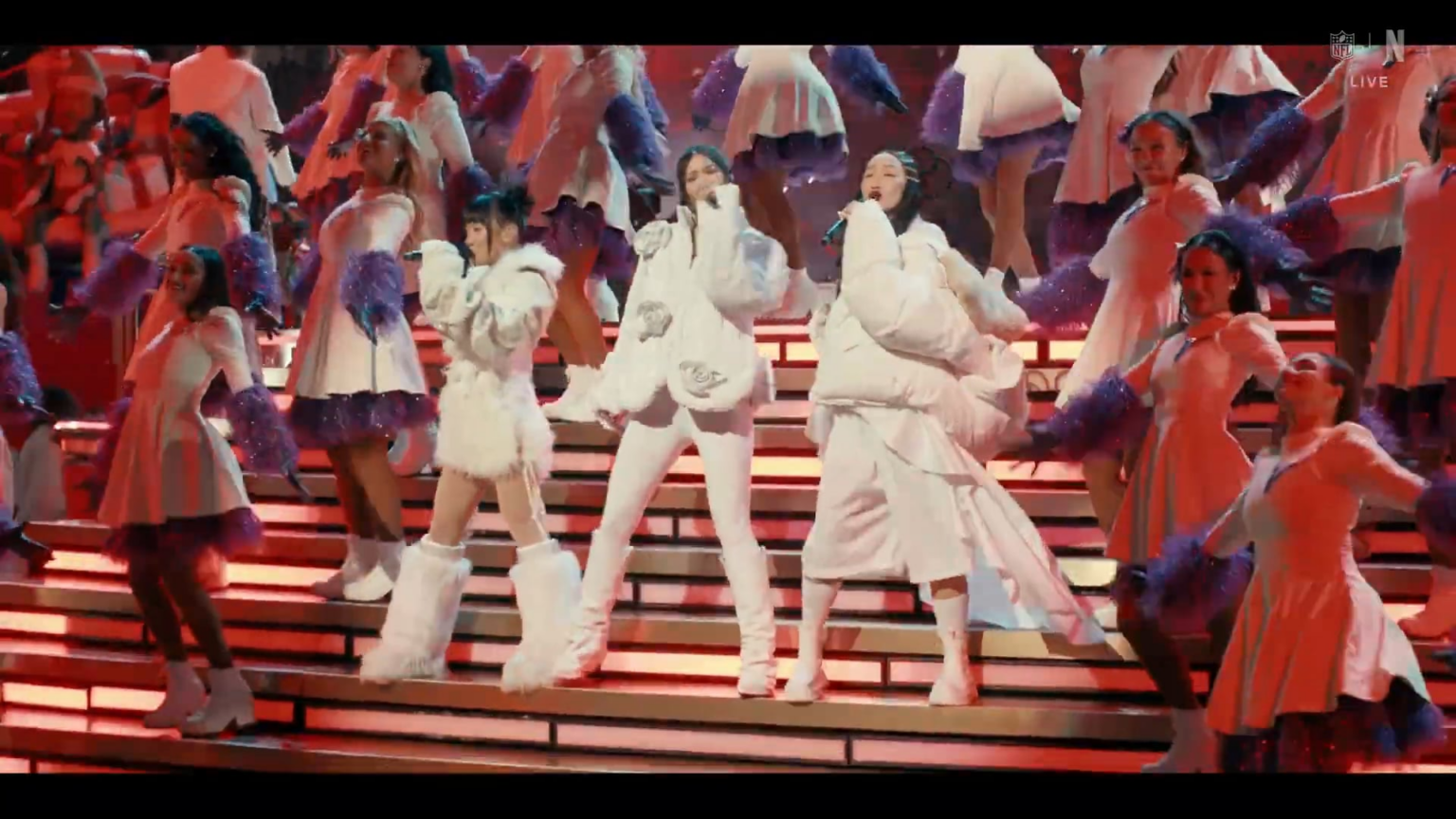 Ejae, Rei Ami, and Audrey Nuna perform "12 Days of Christmas" during the halftime show for Vikings vs Lions game