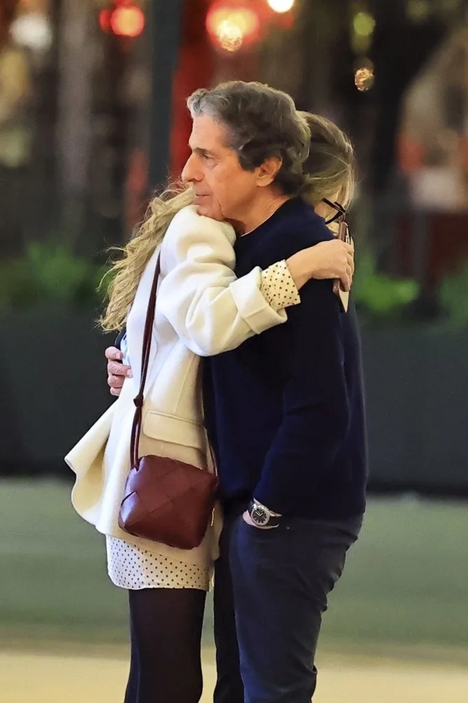 Gayheart and Morton hugging in Beverly Hills on Dec. 3, 2025. BACKGRID
