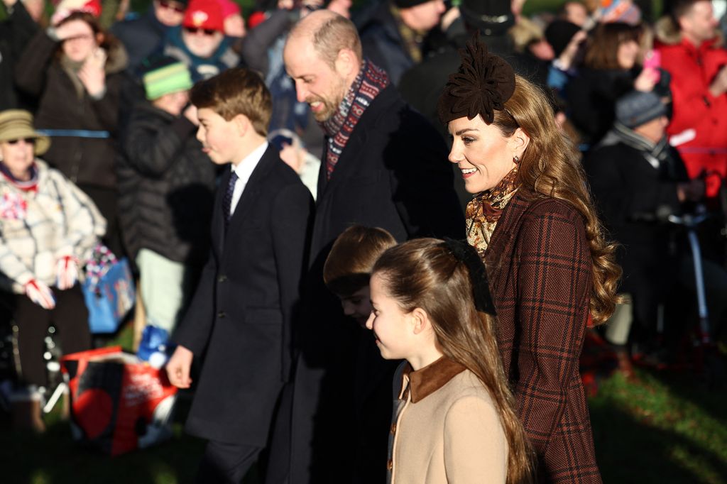 Britain's Prince William, Prince of Wales and his wife Britain's Catherine, Princess of Wales arrive with their children Britain's Prince George of Wales, Britain's Prince Louis of Wales and Britain's Princess Charlotte of Wales  for the Royal Family's traditional Christmas Day service at St Mary Magdalene Church on the Sandringham Estate in eastern England, on December 25, 2025. (Photo by HENRY NICHOLLS / AFP via Getty Images)