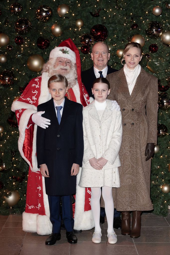 The Monagasque princely family in coats with santa clause