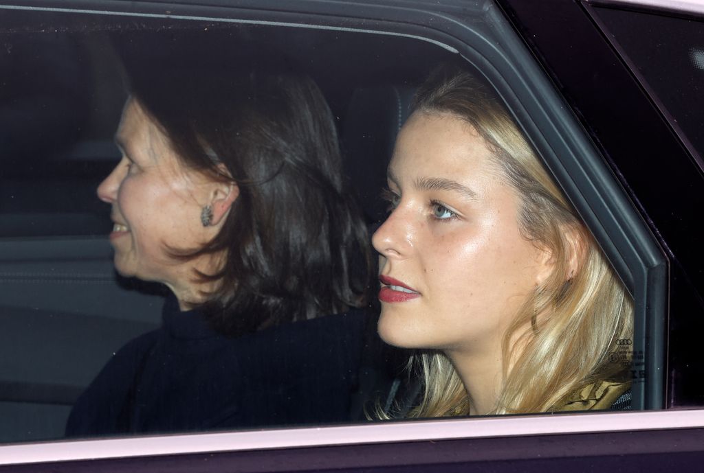 Lady Margarita sat next to her aunt in the car