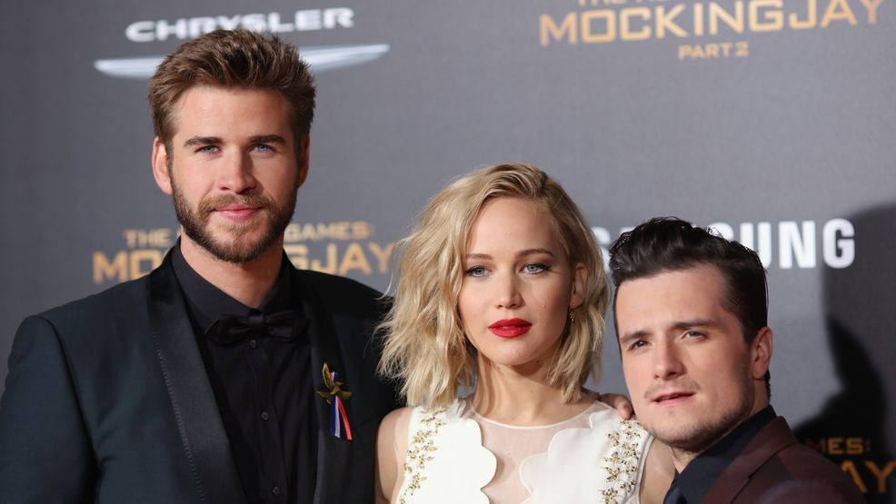 (L-R) Actors Liam Hemsworth, Jennifer Lawrence and Josh Hutcherson attend premiere of Lionsgate's "The Hunger Games: Mockingjay - Part 2" at Microsoft Theater on November 16, 2015 in Los Angeles, California. (Photo by Mark Davis/Getty Images)
