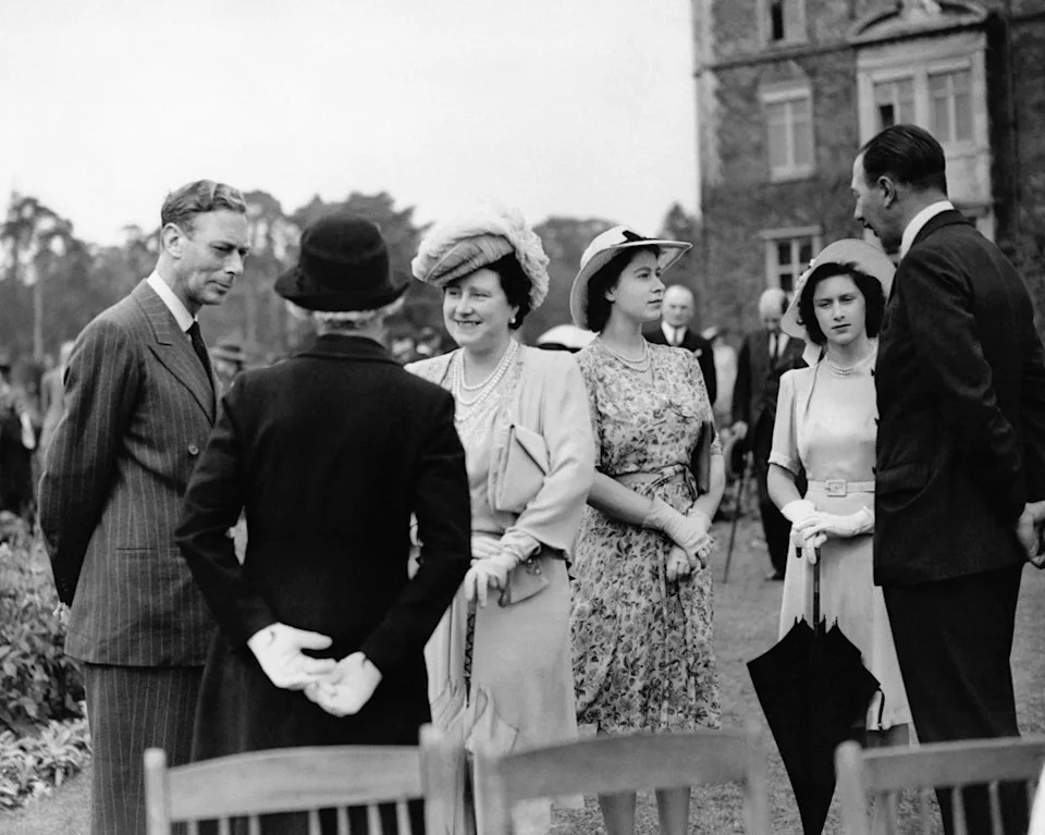 Getty Images King George VI and Queen Elizabeth the Queen Mother at a garden party at Sandringham in 1946.