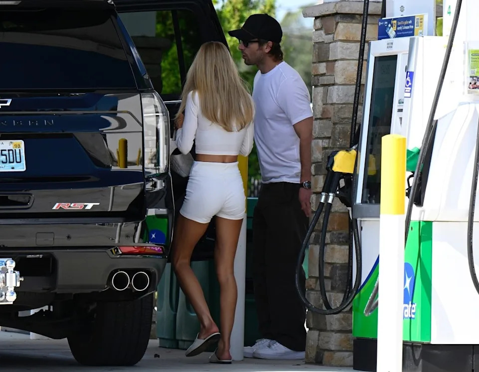 En route to the private airport, they stopped for gas. BACKGRID