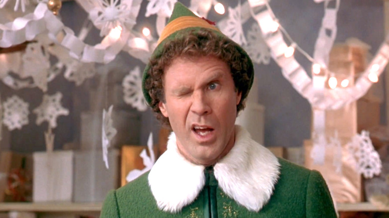 Will Ferrell as Buddy the Elf winking in Elf