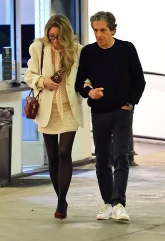 BACKGRID Rebecca Gayheart, 53, was seen sharing sweet PDA with Hard Rock founder Peter Morton, 78, during a rare appearance together at E-Baldi in Beverly Hills.